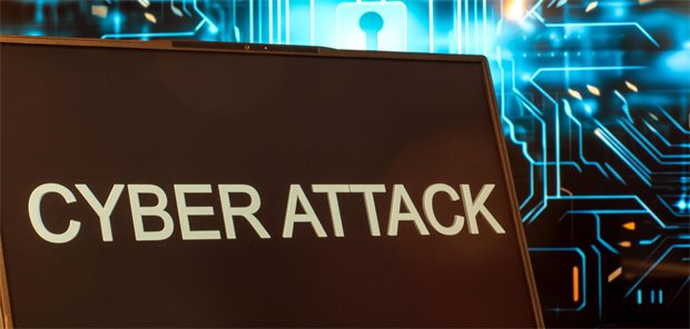 IT-Experte erklärt: So schließen Praxen die Einfallstore für Cyberkriminelle Symbolbild Cyberangriff: Laptop vor virtuellem Computer-Hintergrund