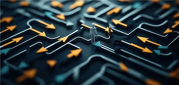 Primärversorgung: Krankenkassen und Ärzte bei digitaler Ersteinschätzung uneins Abstract image depicting a maze-like path with a miniature figure navigating among numerous yellow and teal arrows, representing decision-making and direction choices.